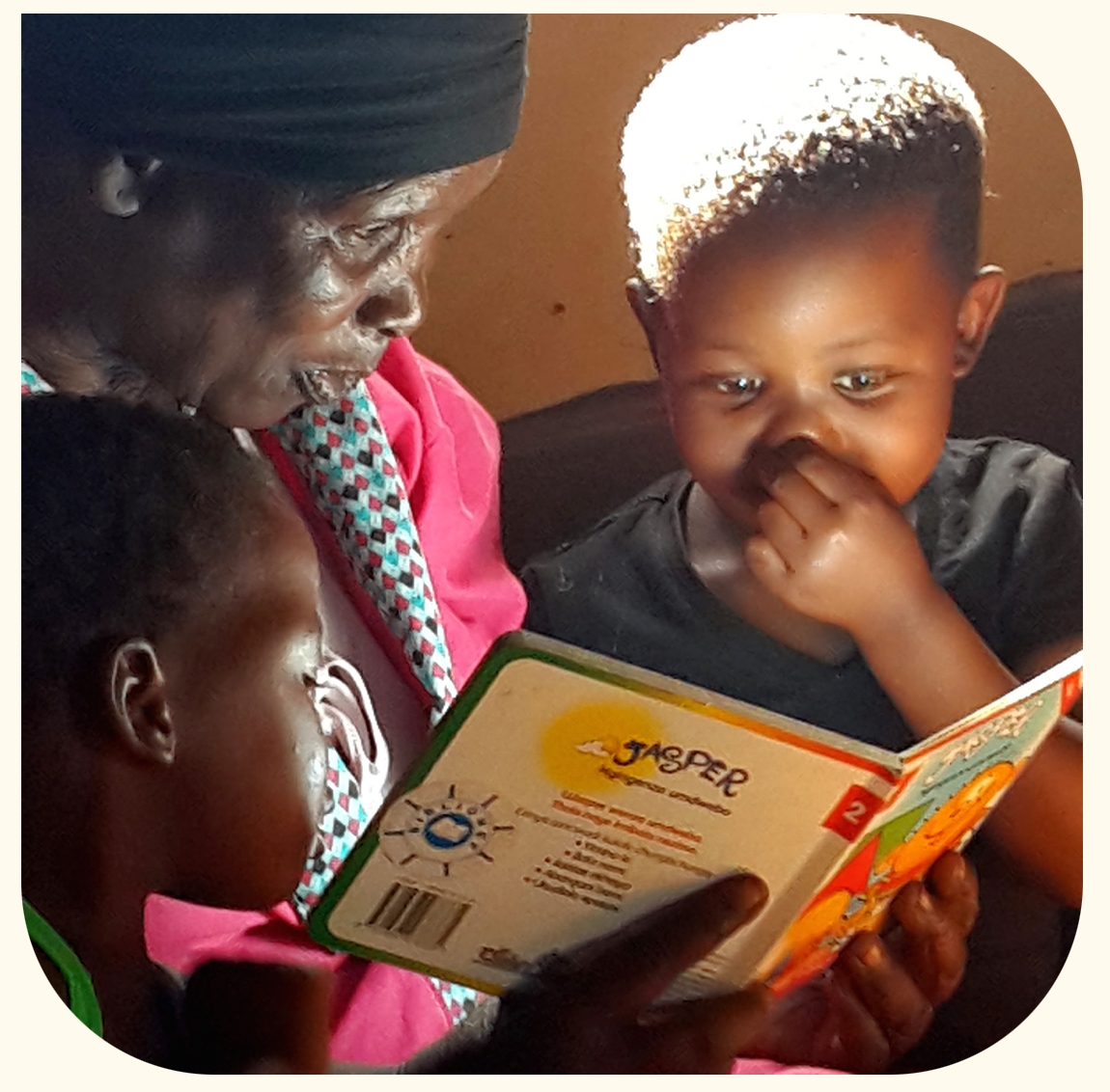 FLP facilitator reading with kids